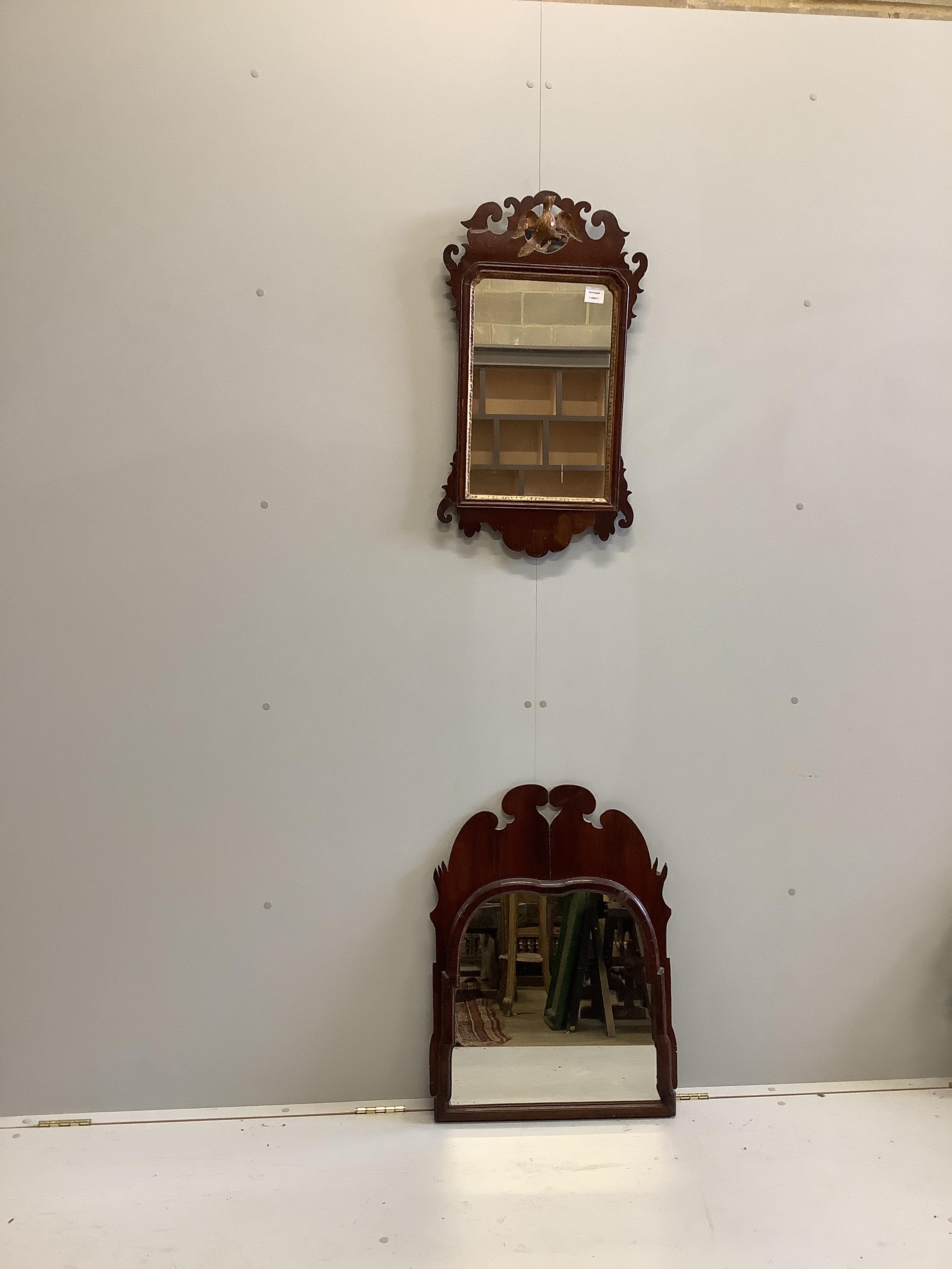 Two 18th century style walnut fret cut wall mirrors, largest width 55cm, height 70cm